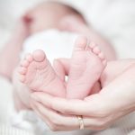 close-up-of-hands-holding-baby-feet-325690-1024x683.jpg
